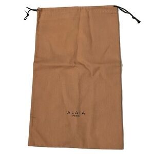 Alaia Paris‎ tan drawstring dust bag